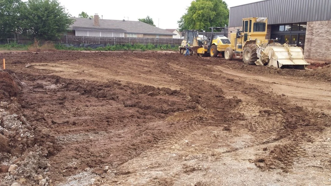 Soil stabilization work in progress preparing subgrade for construction.