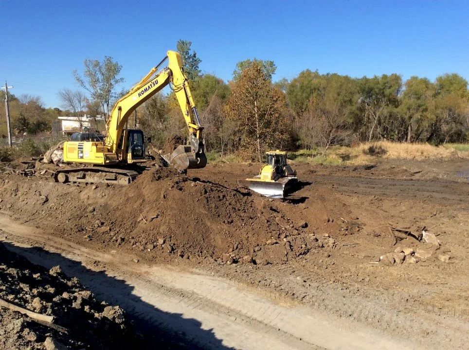 Aggregate placement and compaction for soil stabilization and building pad construction