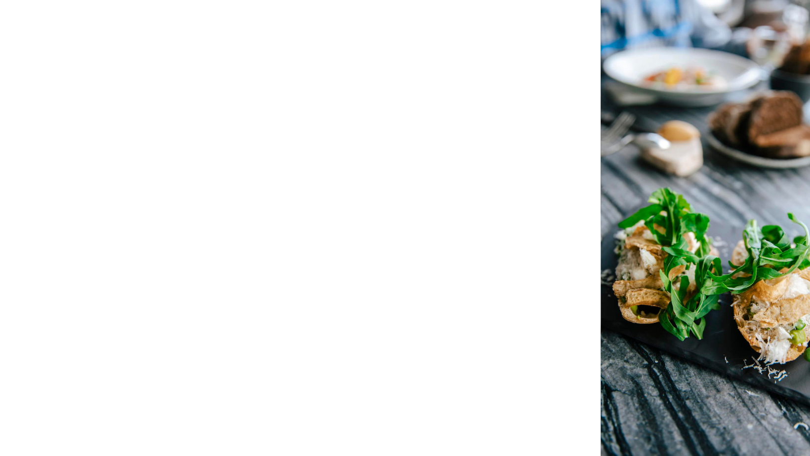 Piece of fancy toast on a plate at a dining establishment on a very amazing vacation