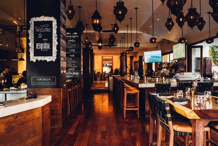 Inside of Bar Esquine in Cabo. You can see their black chandeliers.