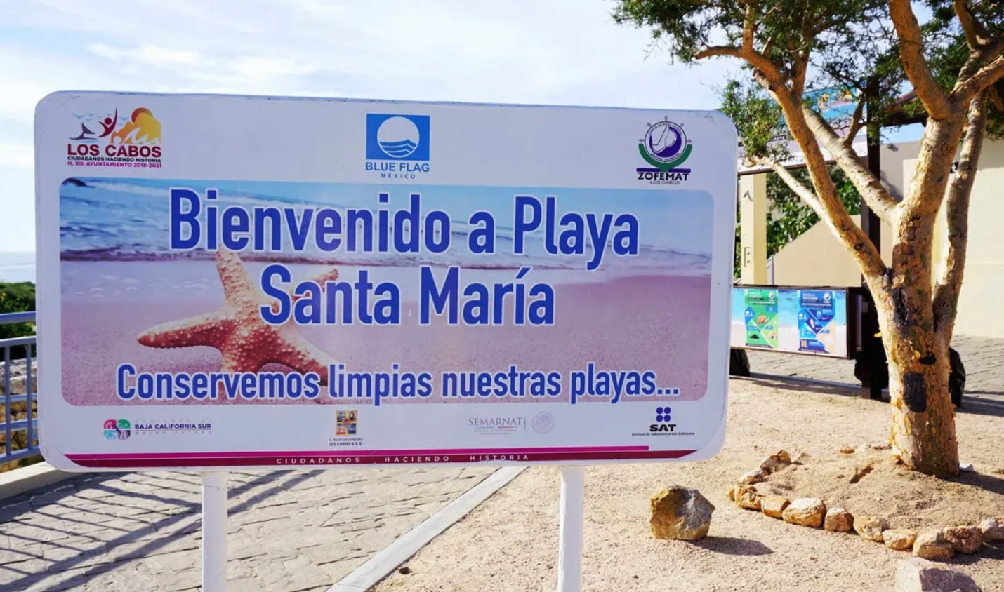 Santa Maria Bay snorkeling beach in Cabo sign for beach vacation rentals in Cabo San Lucas Mexico ocean view 
