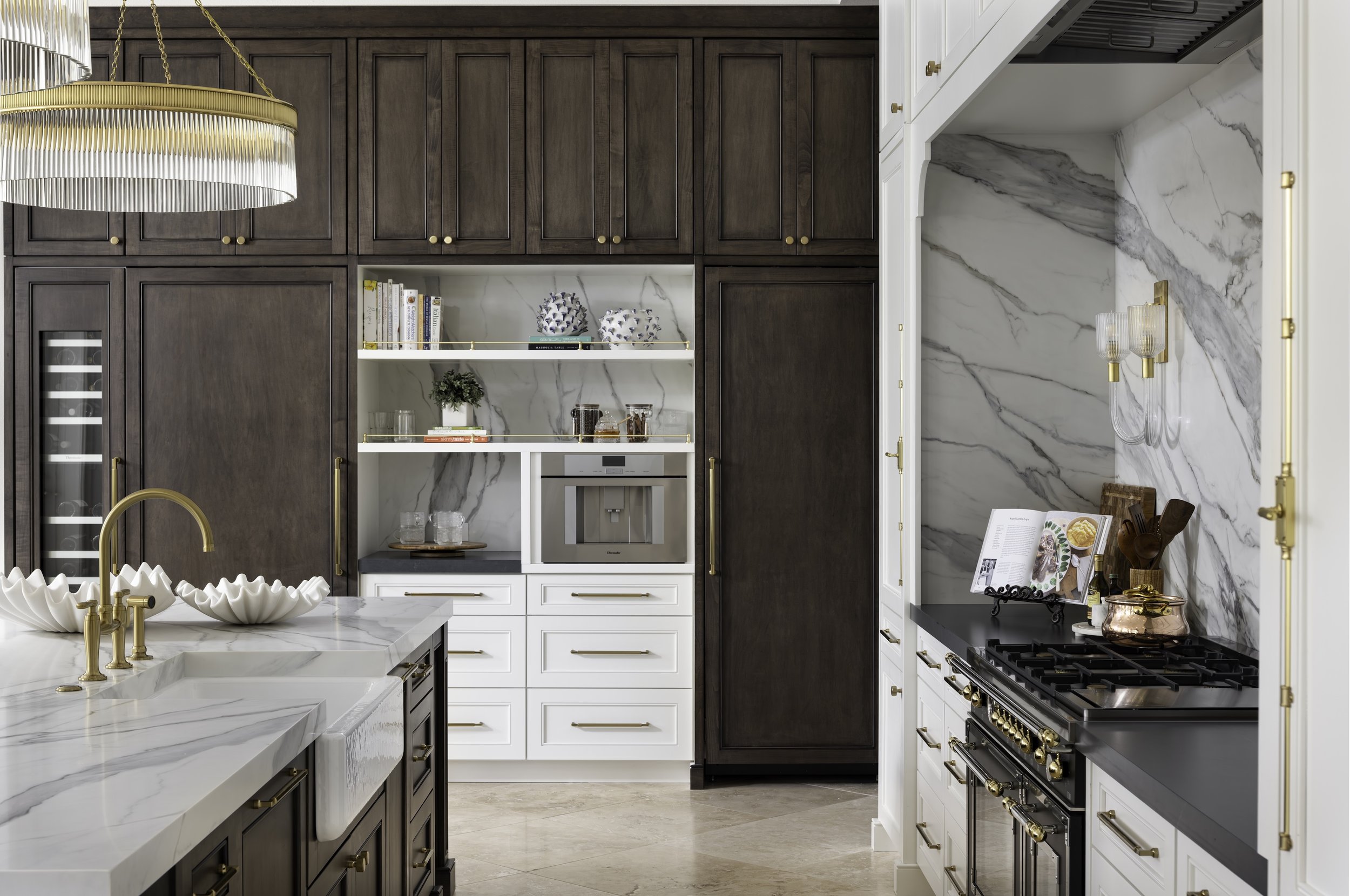 a luxurious modern kitchen with white granite counter tops