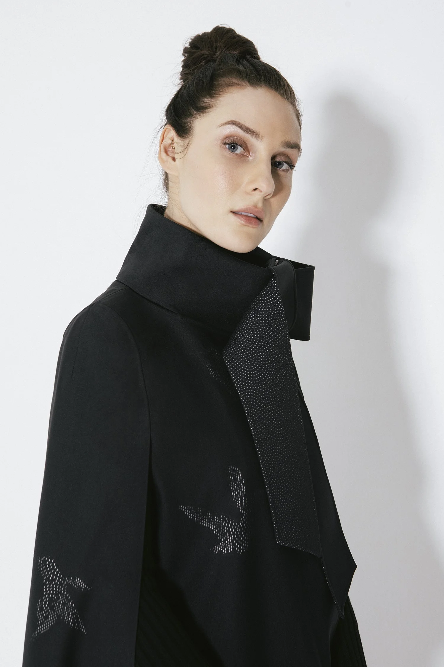 High fashion model wearing a Cape de Coeur cape.