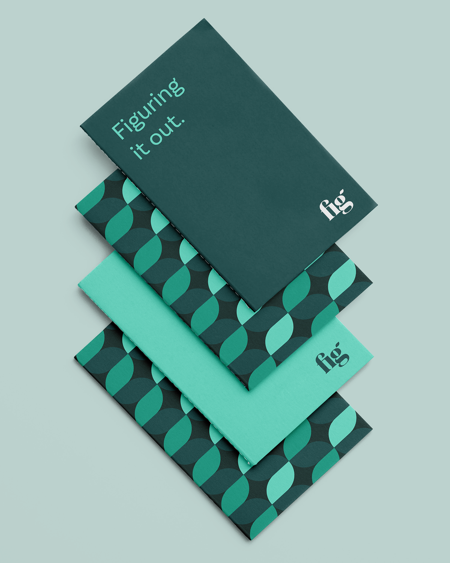 Stacked notebooks for Fig Financial.