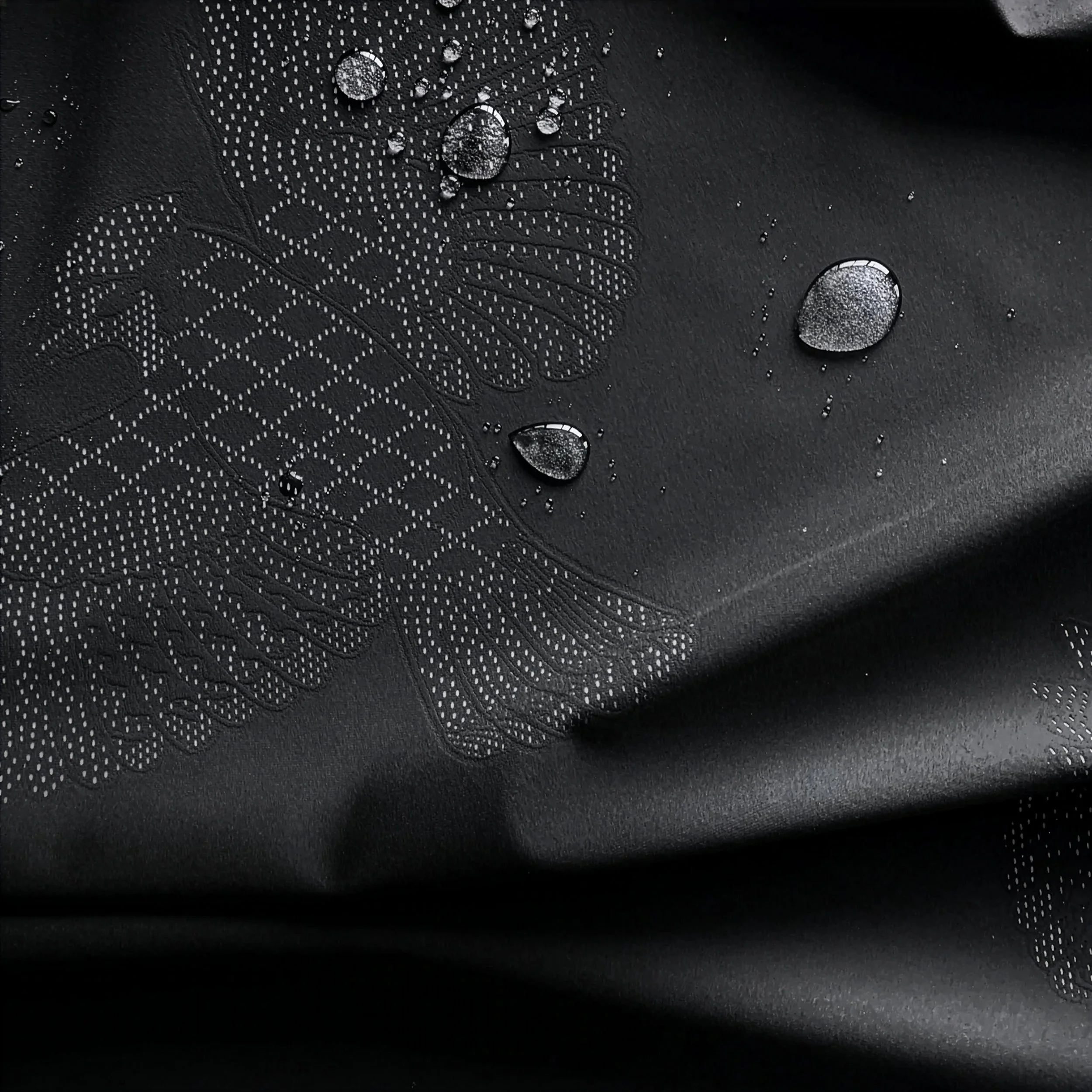 Close-up of Cape de Coeur black fabric.