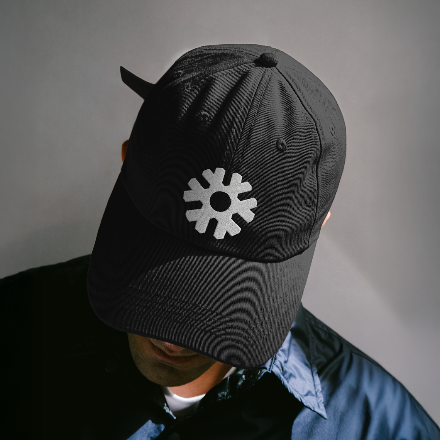 Baseball hat with embroidered logo for Micron Mechanical.