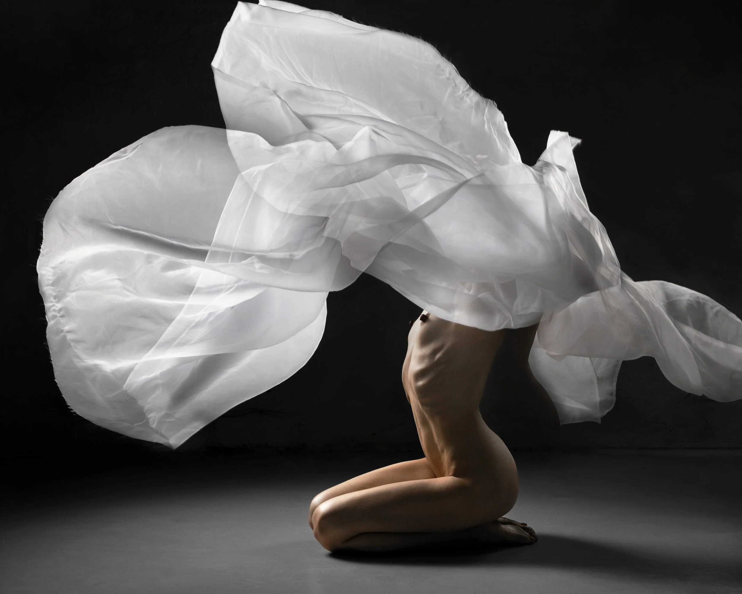 Nude woman with fabric