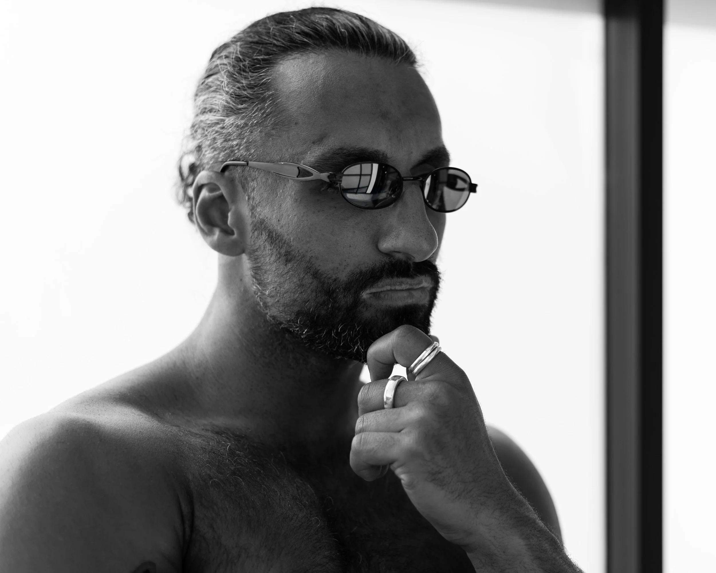 A black and white portrait of a man