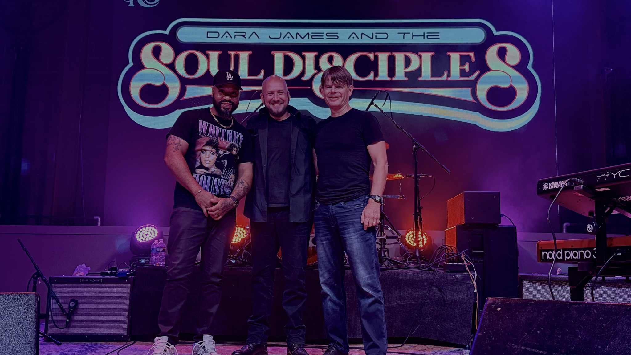 Dara James and the Soul Disciples performing live, featuring soul and blues instrumentation