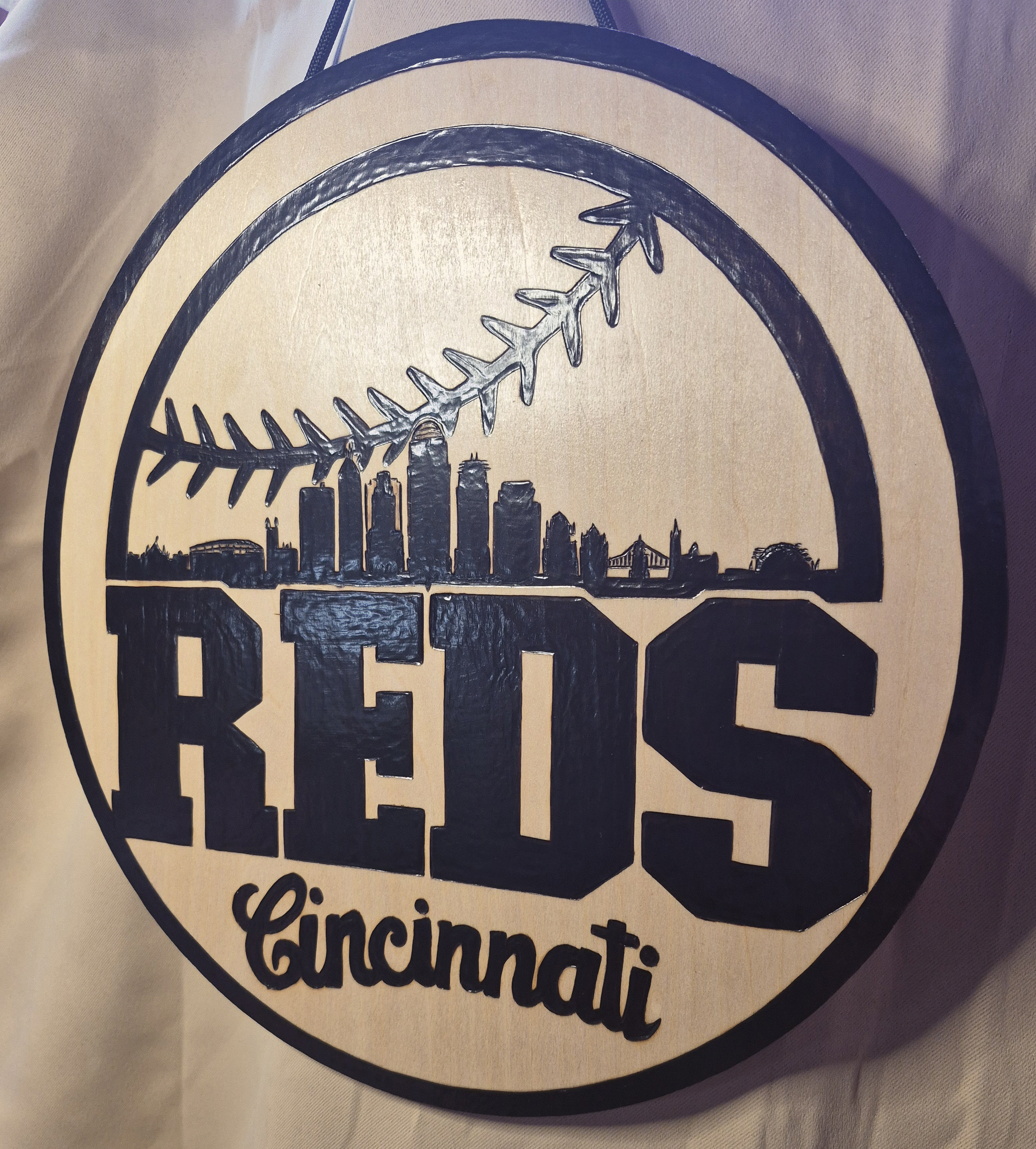 Cincinnati_Reds_Baseball_Side_2.png