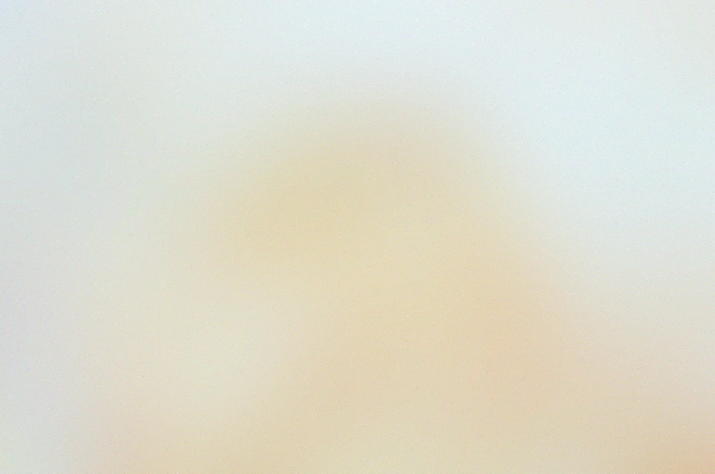 Abstract background with a yellow and white gradient.