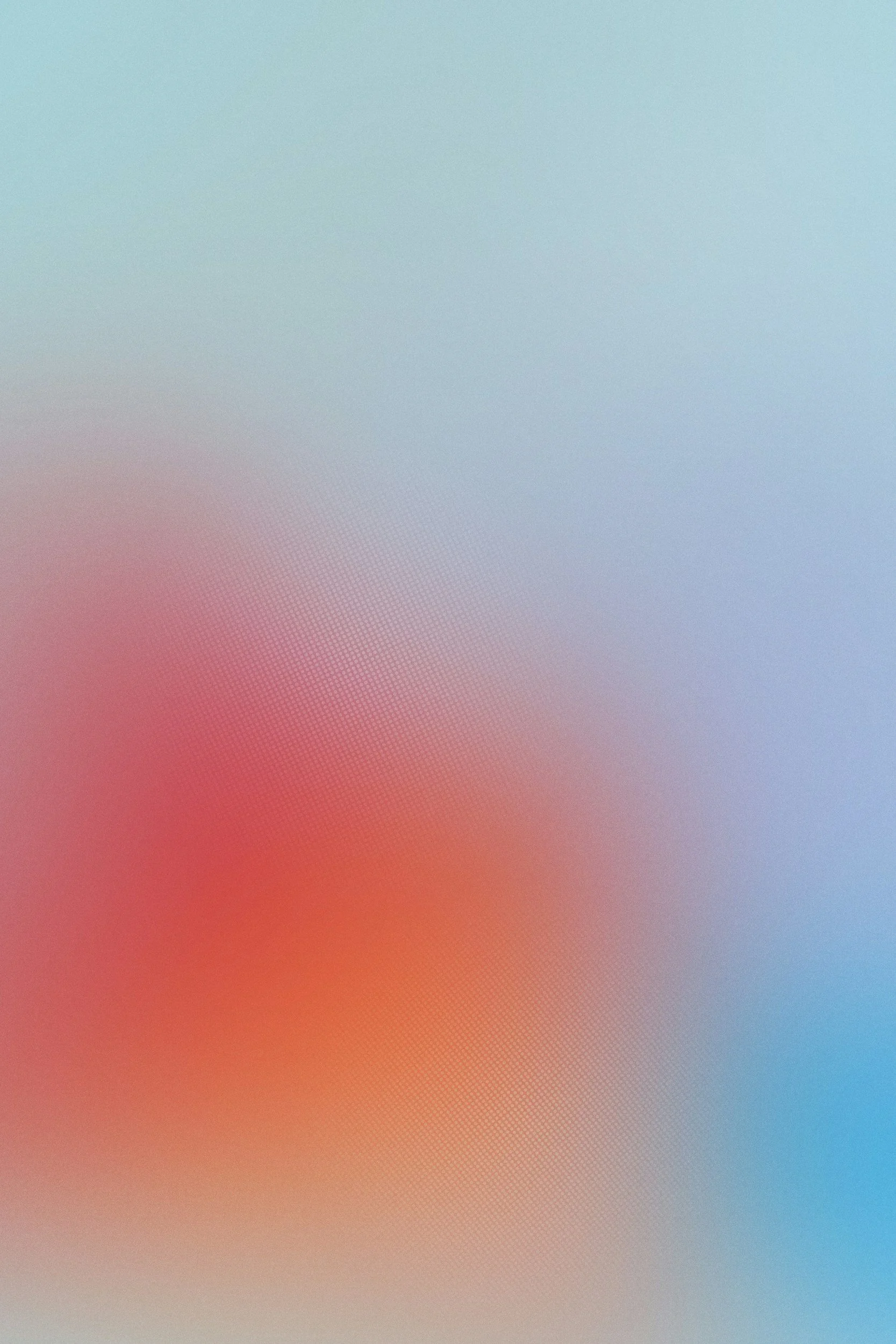 This image is blurred and abstract, with soft pastel colors including red, blue, green, and orange, making it difficult to identify specific objects.