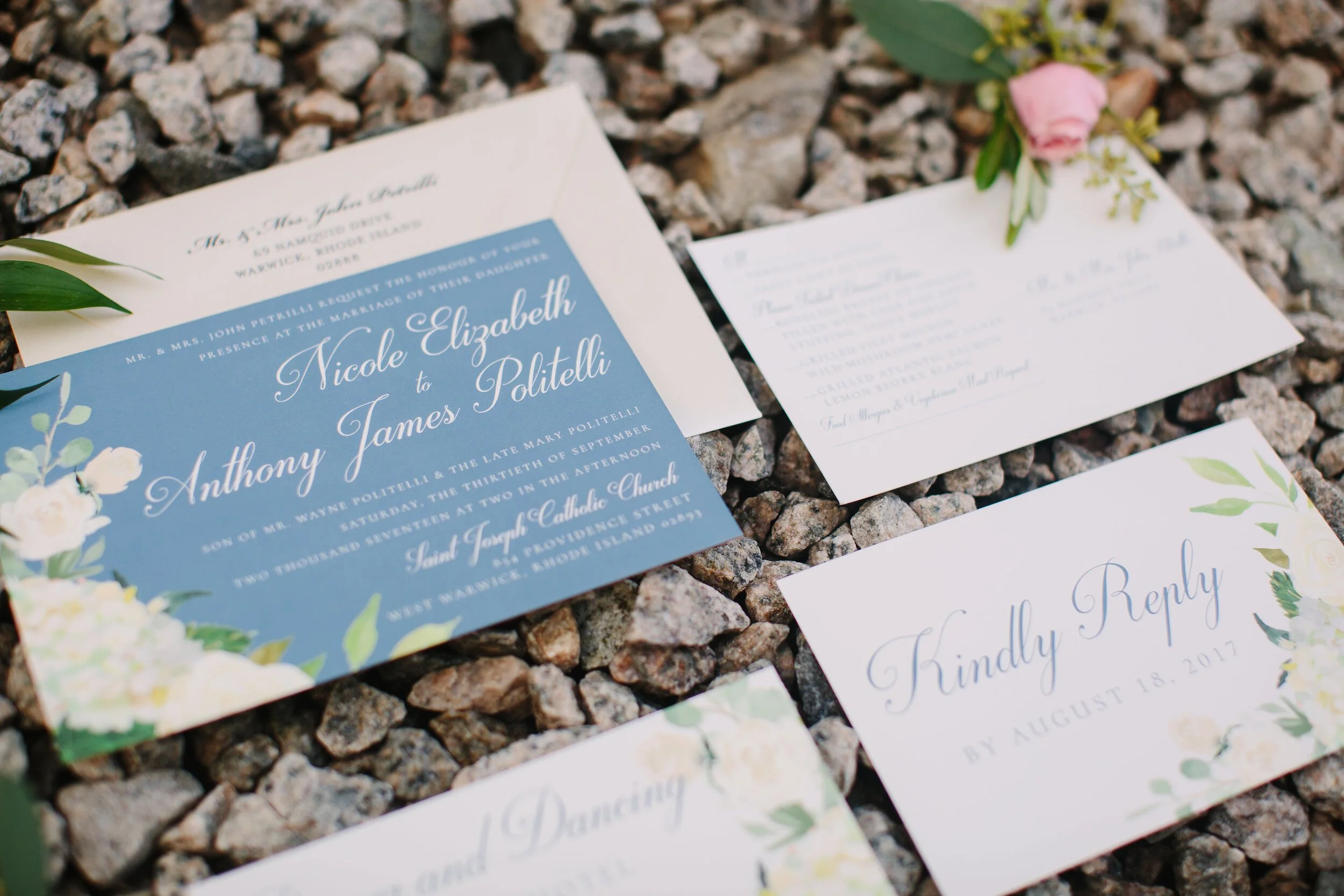 Classic typefaces paired with slate blue and watercolor florals on thick premium paper stock for this September wedding. Wedding: St. Joseph's Catholic Church, West Warwick, Rhode Island and Crowne Plaza, Warwick, Rhode Island. Table numbers, drink s