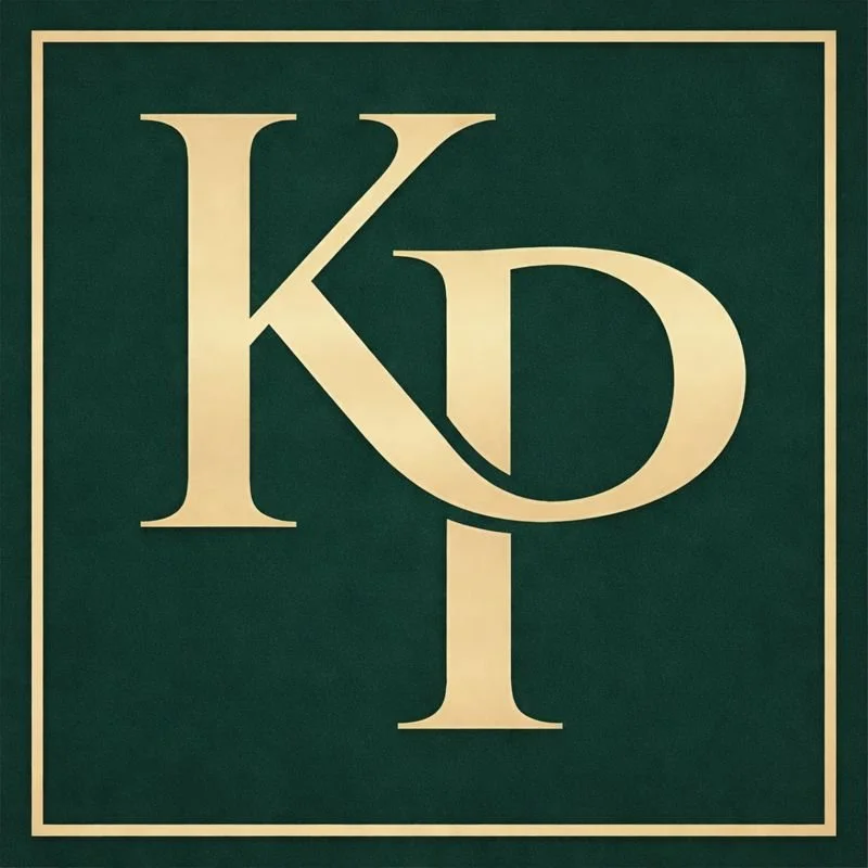 A dark green background with the large, cream-colored letters 'KP' in the center.
