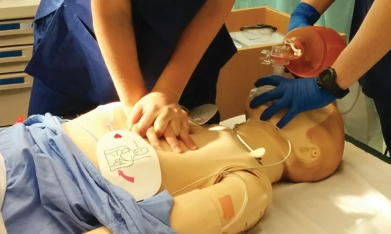 CPR being performed on a manequin