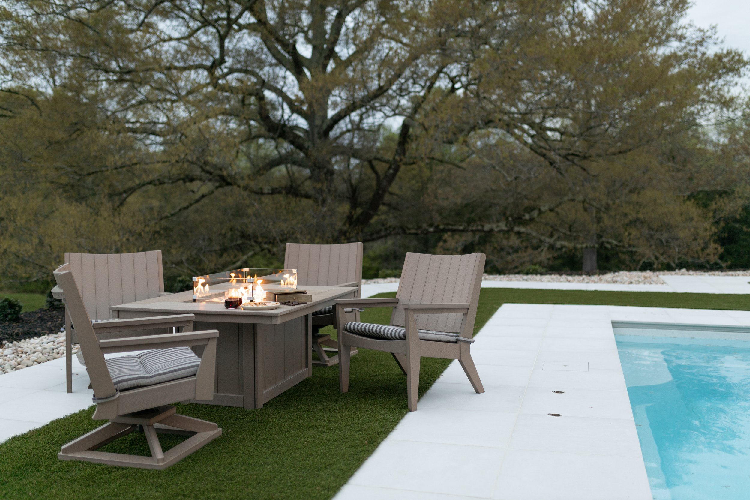 Mayhew Chat Chairs & Swivel Rockers with Donoma in Weatherwood. Seat Cushions in Sail Away Java 2.jpg