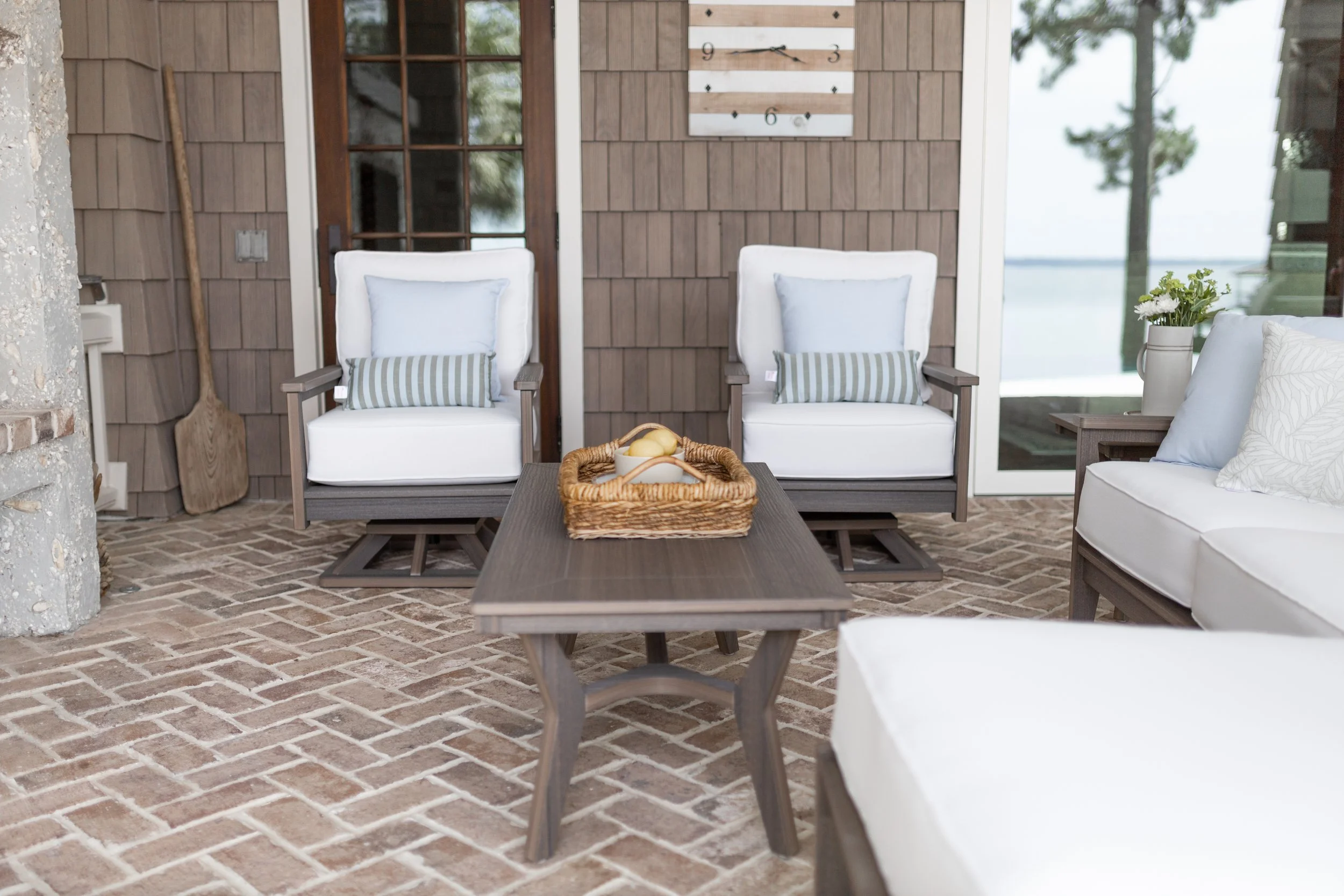 Mayhew Swivel Rockers and Rectangular Coffee Table in Coastal Gray with cushions in Iona Alabaster.jpg
