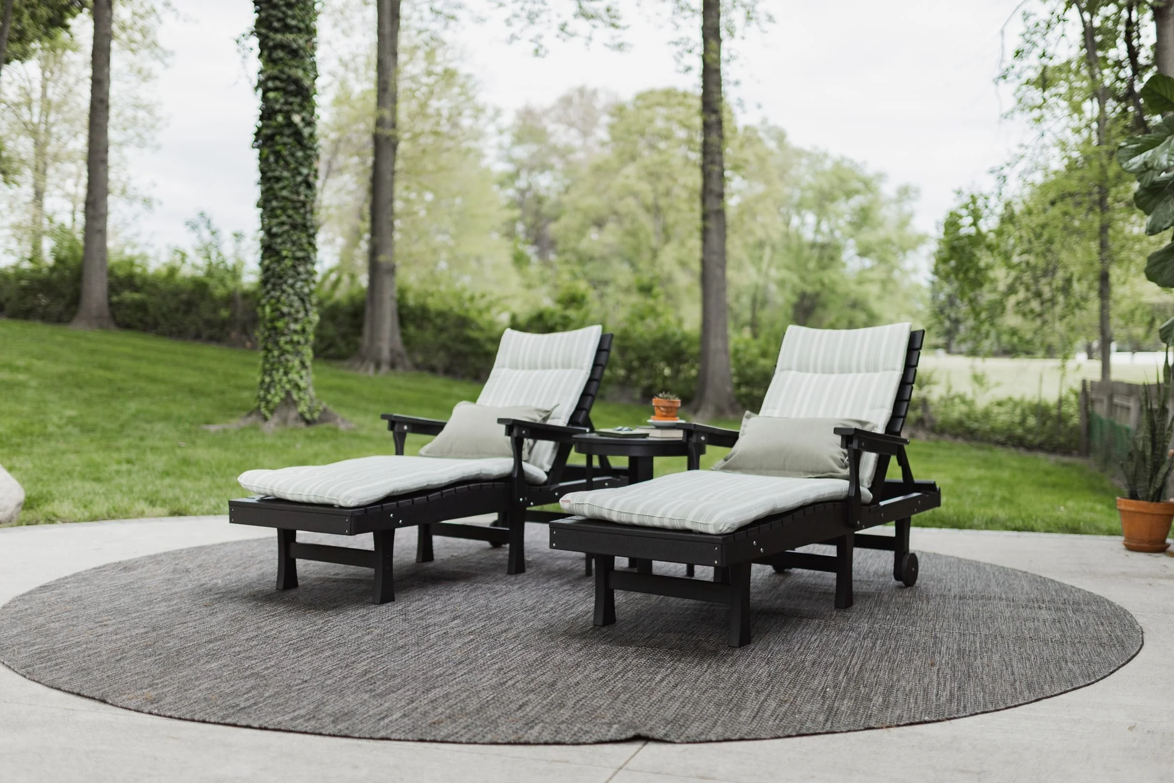 Black Bristol Chaise Lounge with Round End Table. Chaise cushions in Tranquil Sage. TP in Heritage Leaf.jpg