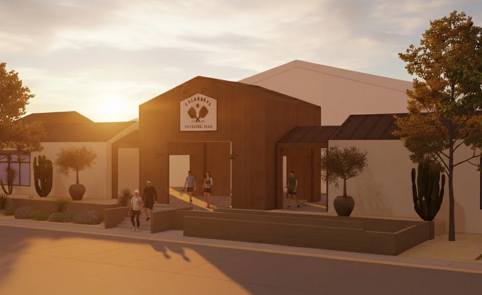 Rendering of the Calaveras Pickleball Club building illuminated by sunset, with trees and people walking outside.