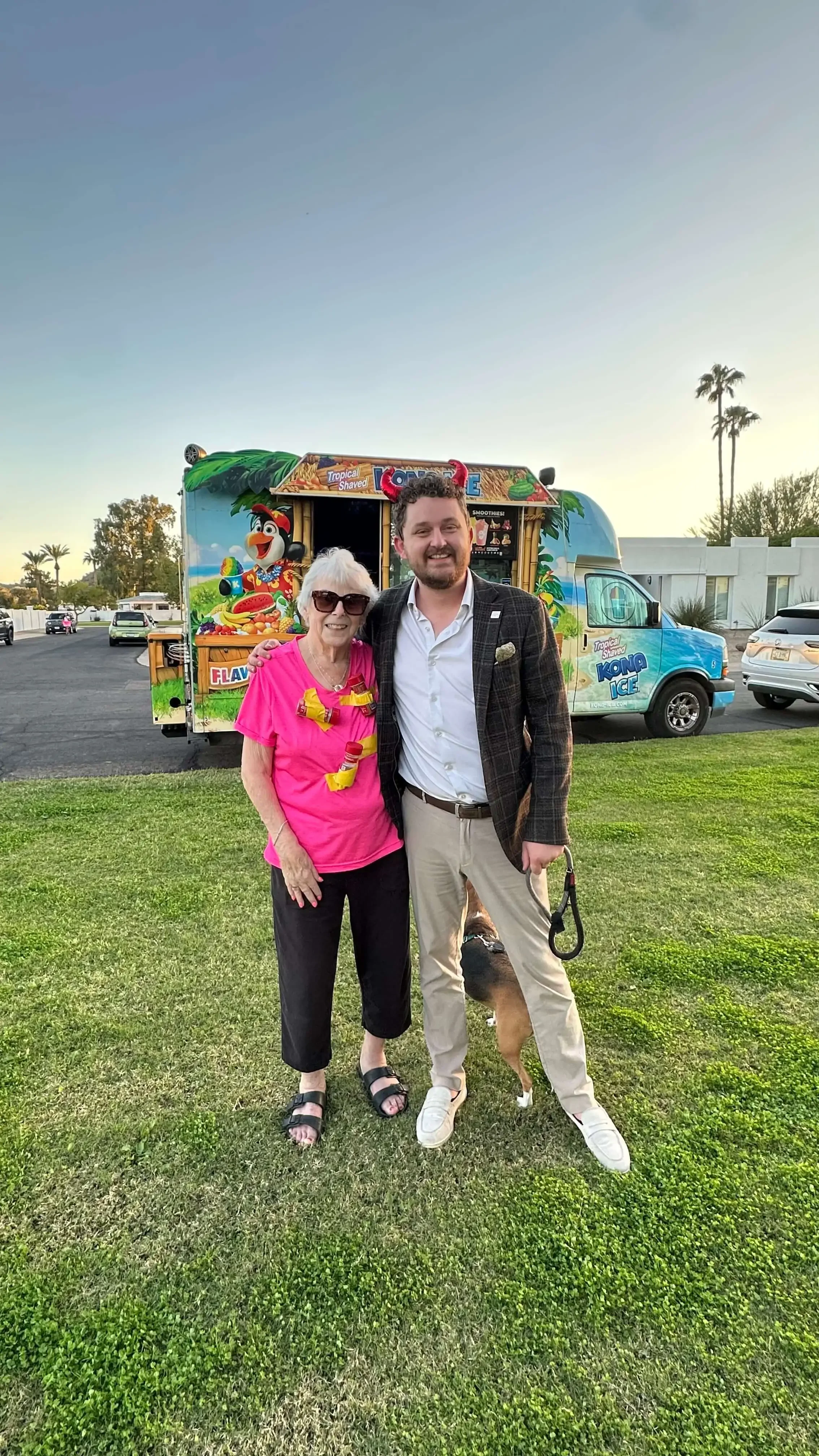 Clients and their pets enjoying a weekend outdoor community meetup hosted by Bryant Real Estate in Phoenix.