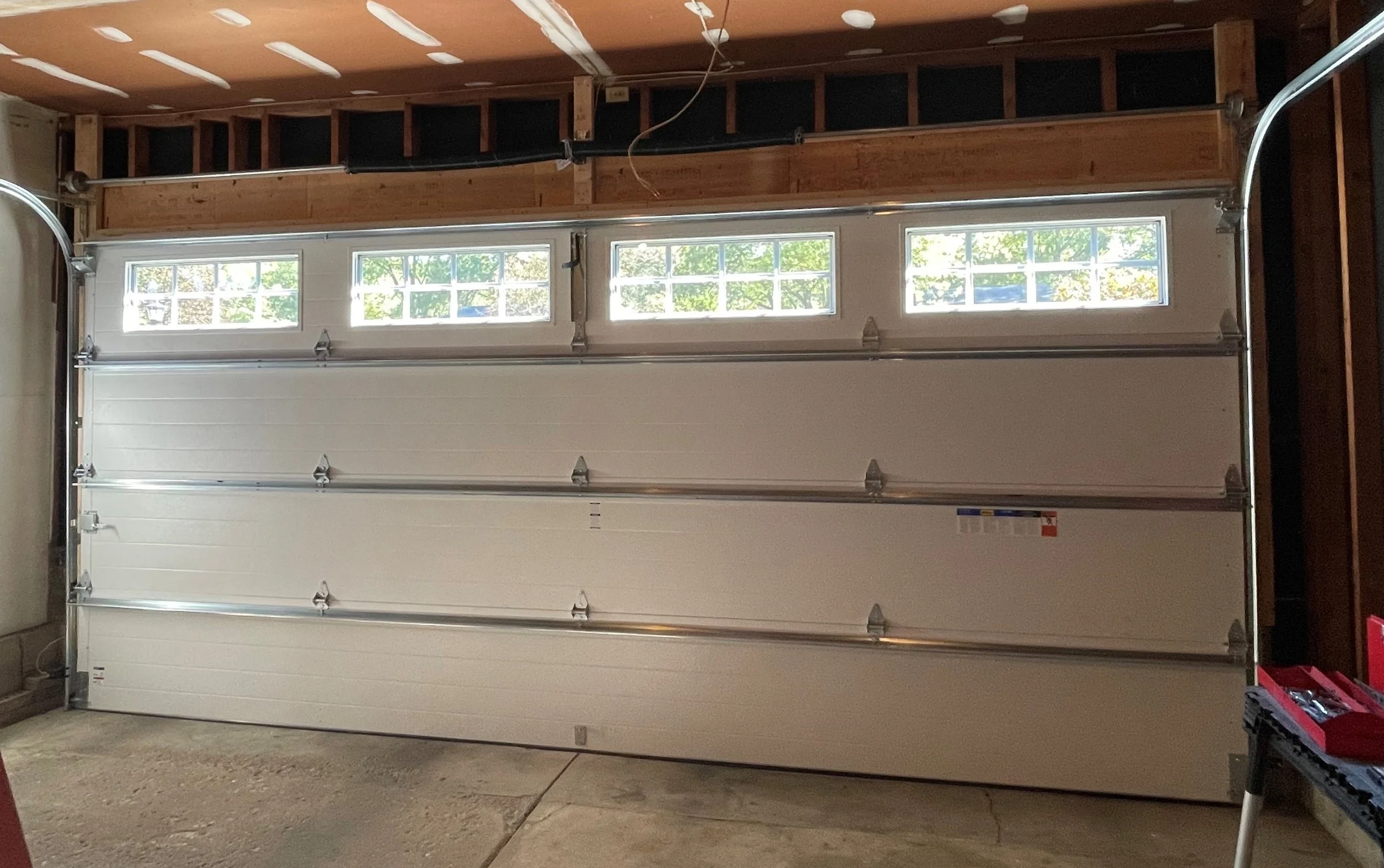 After Replacement: Interior of a single 18-by-6 foot garage door 