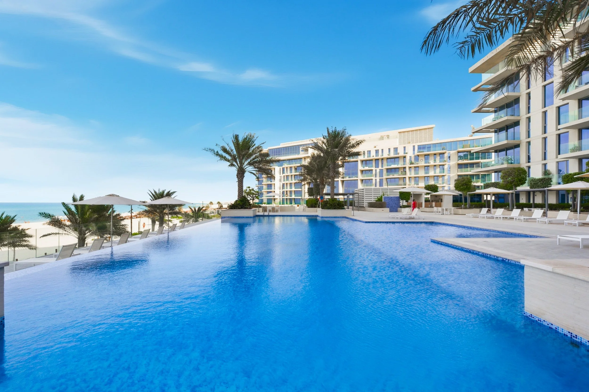 Infinity pool & direct beach access.