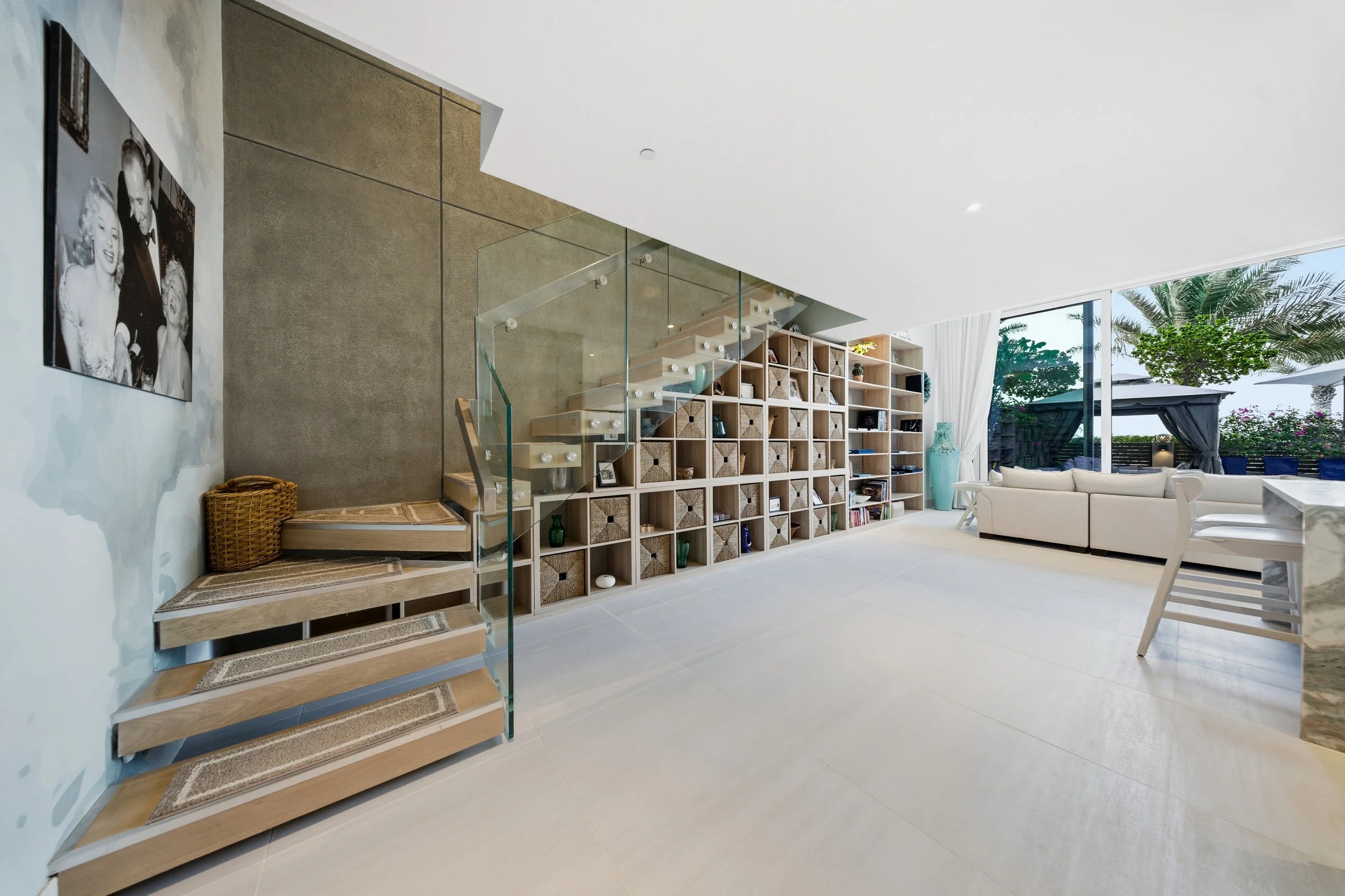 Modern staircase guiding you to your private loft hideaway.