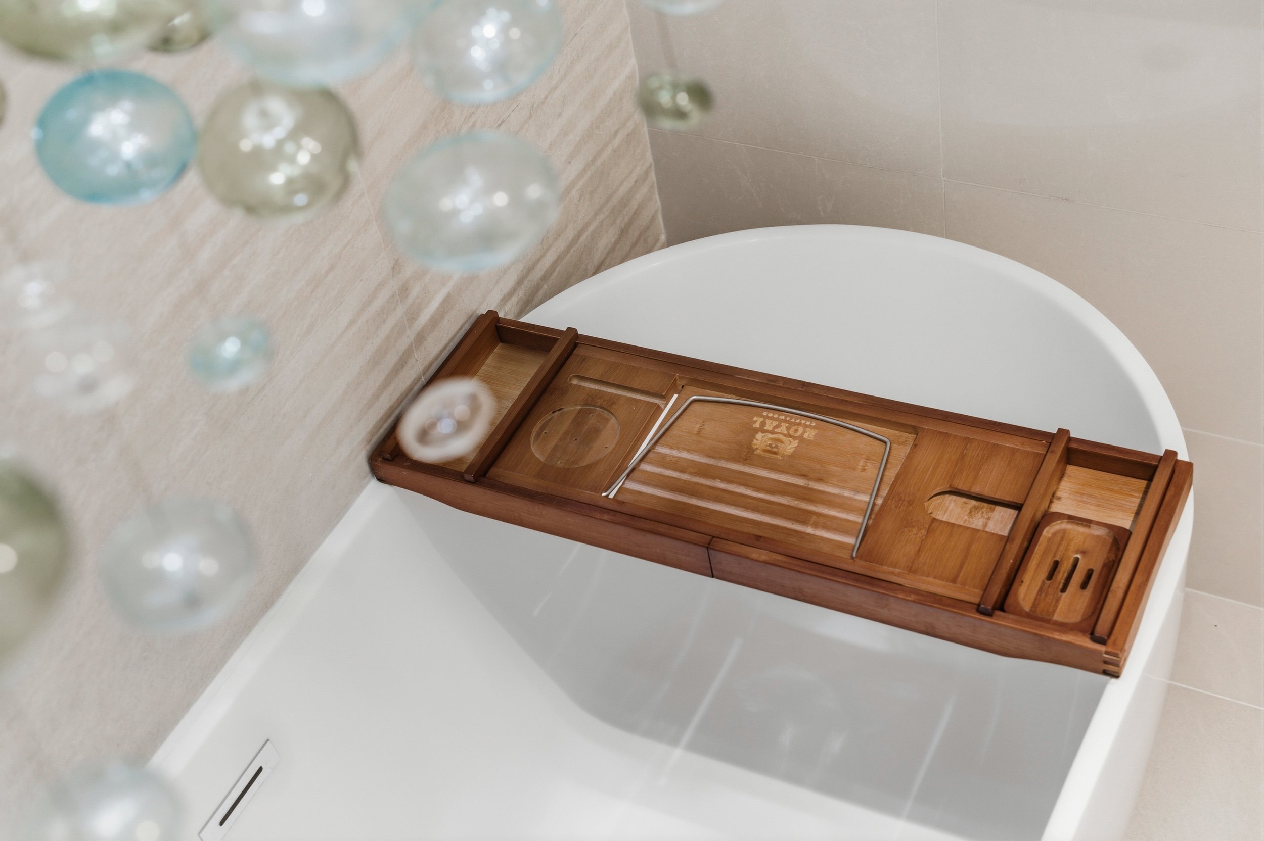 Bath tray for relaxing with a book or drink.