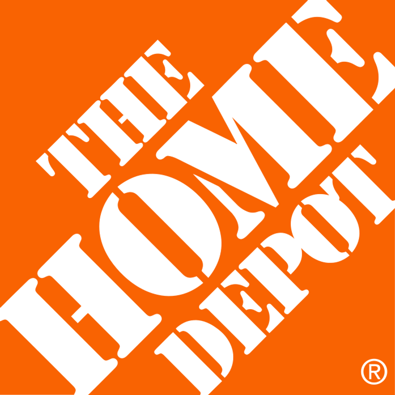 Close-up of an orange background with white text that reads 'The Home Depot' in a bold, stylized font.