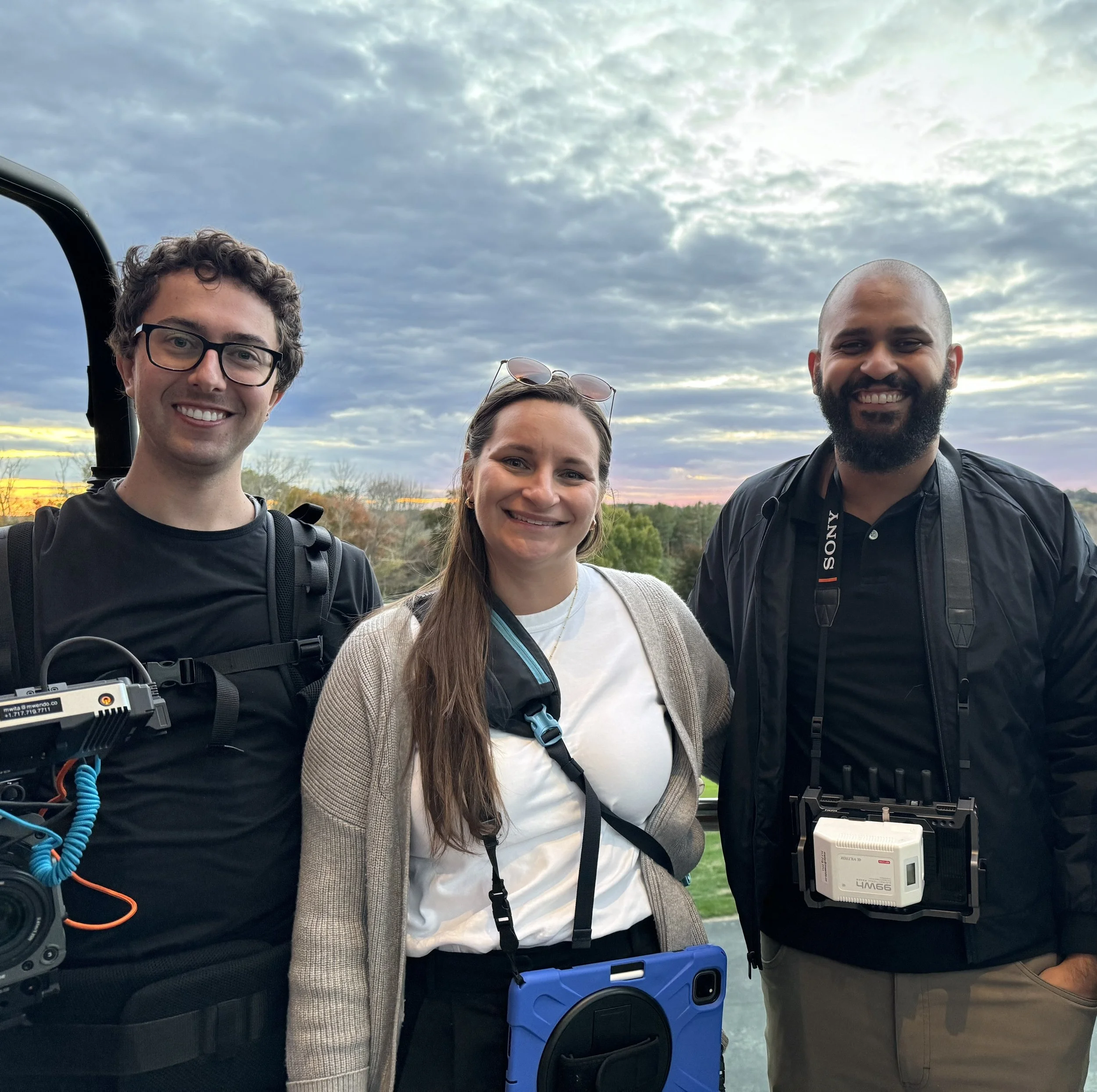 Tori Paris with film crew colleagues on a job site.