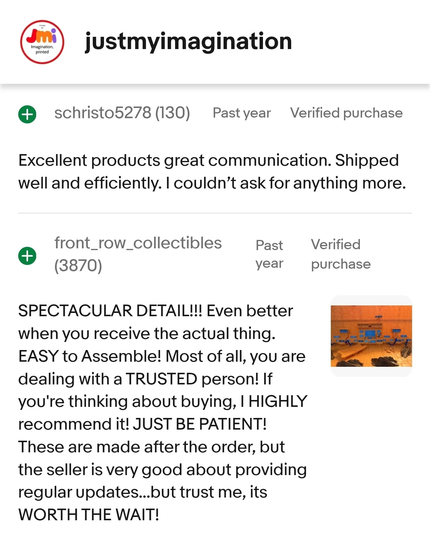 Screenshot of online reviews on a website named justmyimagination, with text praising products and their delivery, and showing a thumbnail image of a display setup.