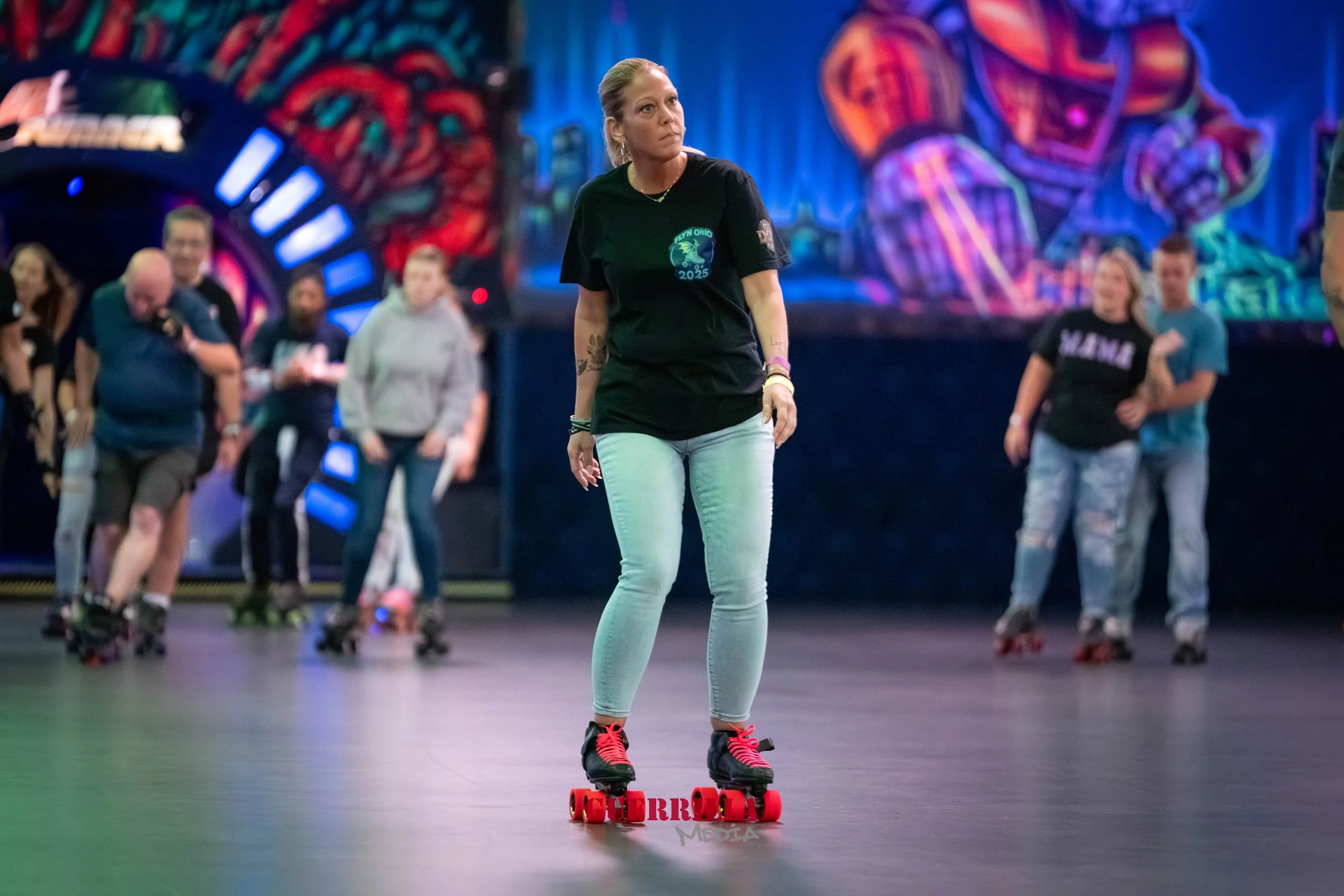 A woman roller skating in a scene with a colorful, neon-lit background, surrounded by other skaters.