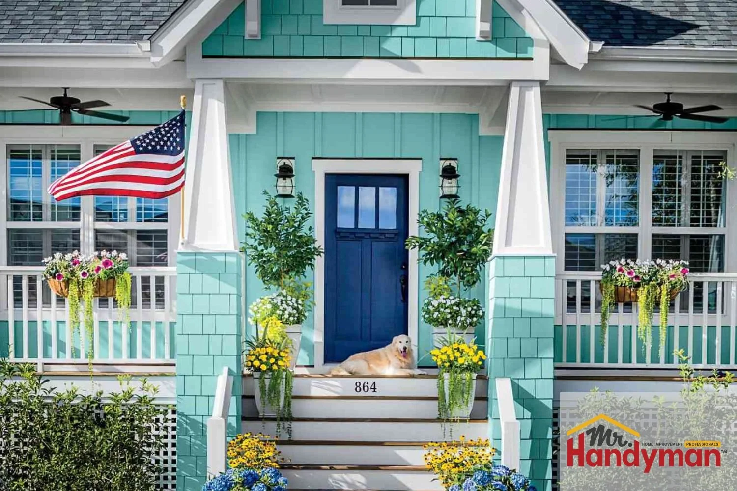 Front view of a home with vibrant blue siding, white trim, and a welcoming entryway, showcasing professional siding installation by Mr. Handyman of Clearwater & Tampa.