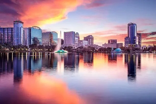 Colorful sunset reflecting off city skyline and water in Largo, Florida