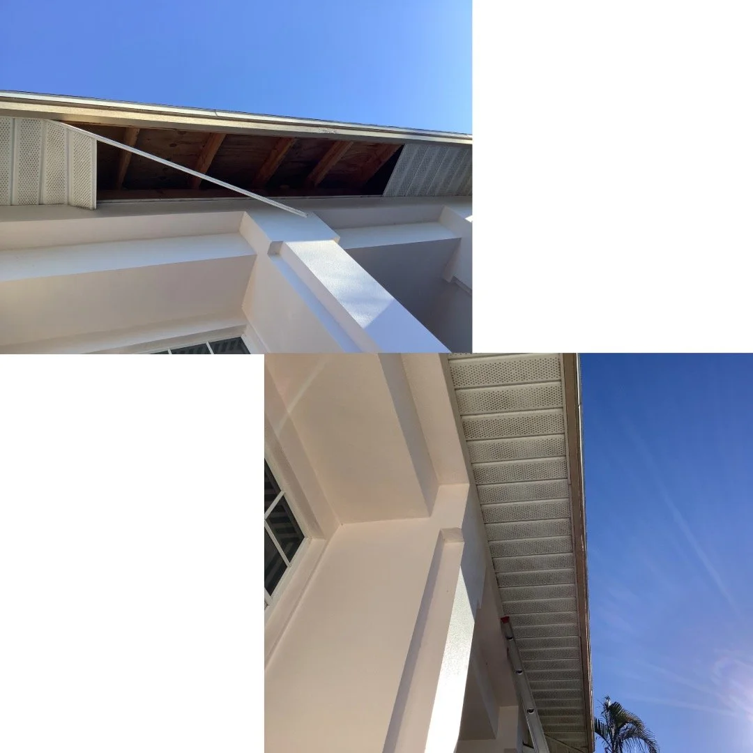 Damaged vinyl soffit panels being replaced along the edge of a white stucco home.
