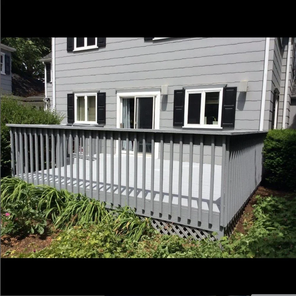 Freshly painted gray deck with railings on a residential home in Tampa and Clearwater.