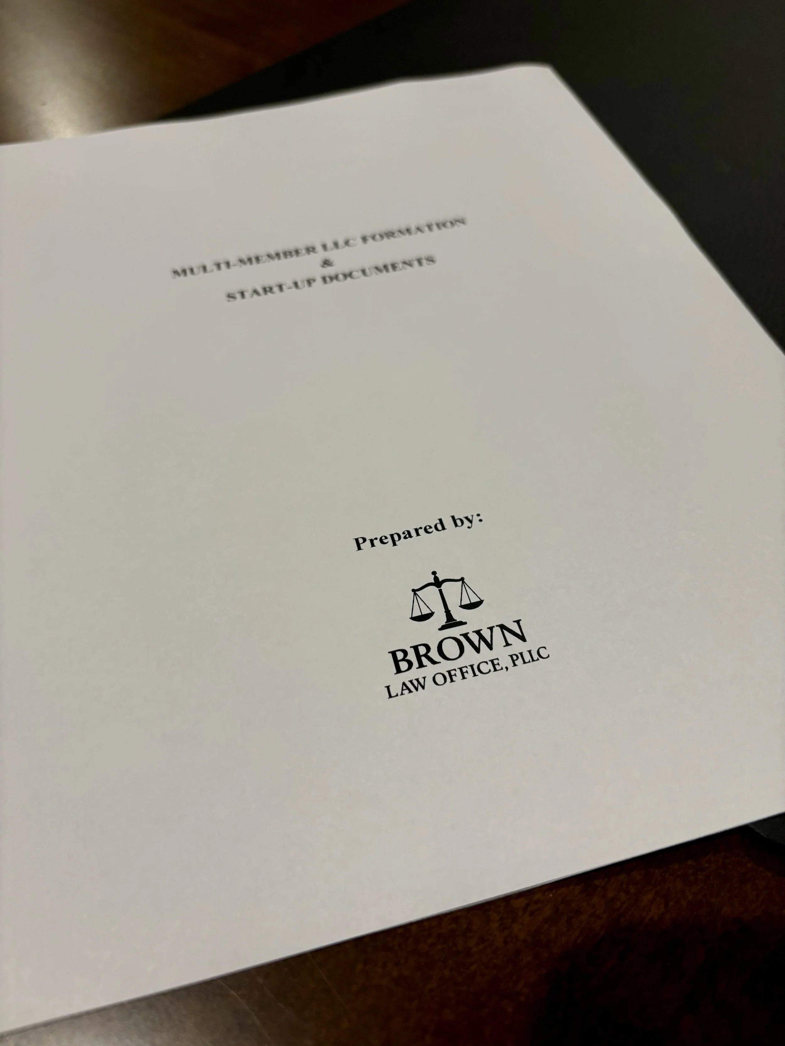 Cover page of a document titled 'Multi-Member LLC Formation & Start-up Documents', prepared by Brown Law Office, PLLC, featuring a logo of a balanced scale.