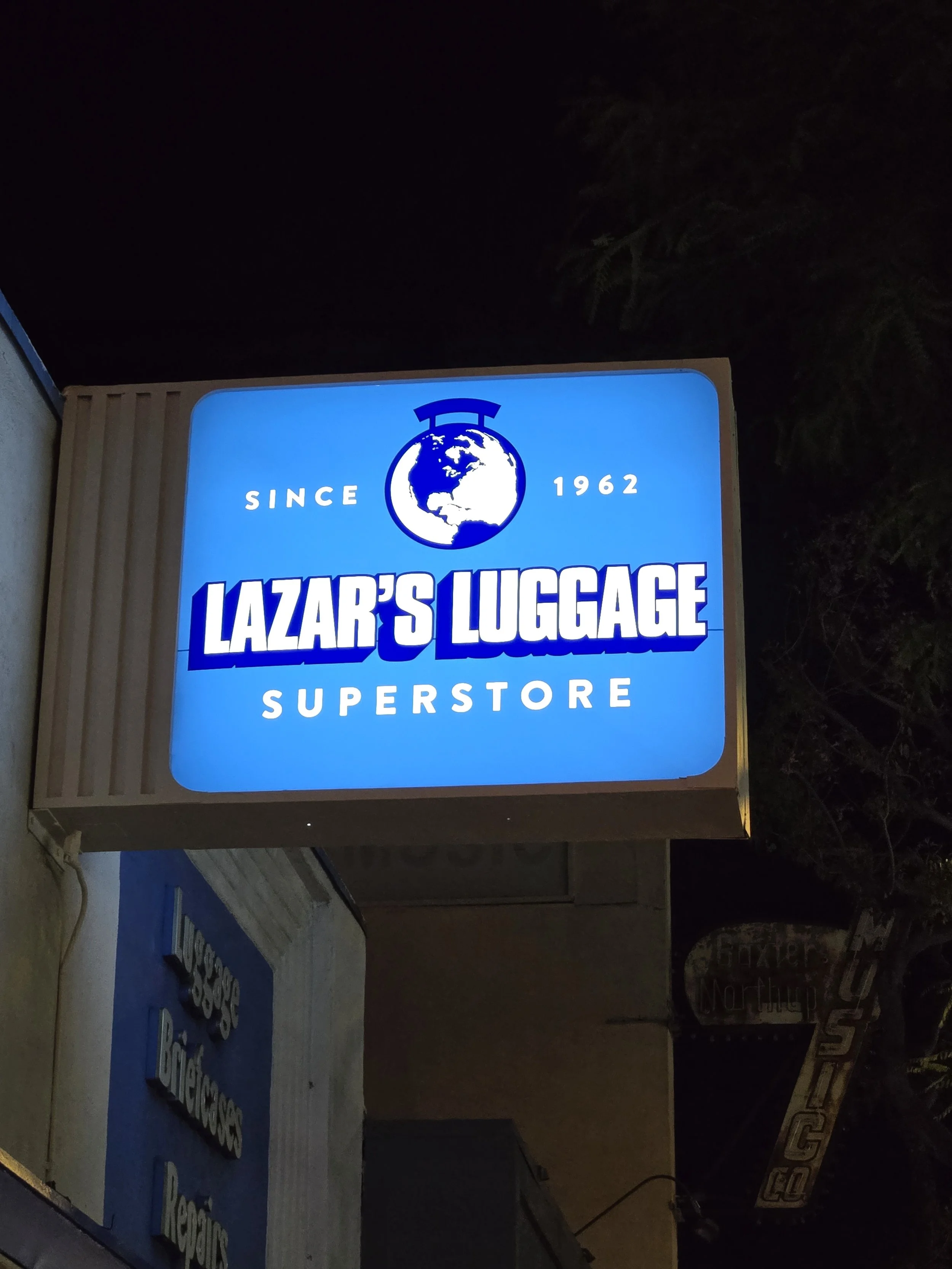 Lightbox sign refurbished with new lexan panels and cast vinyl translucent graphics