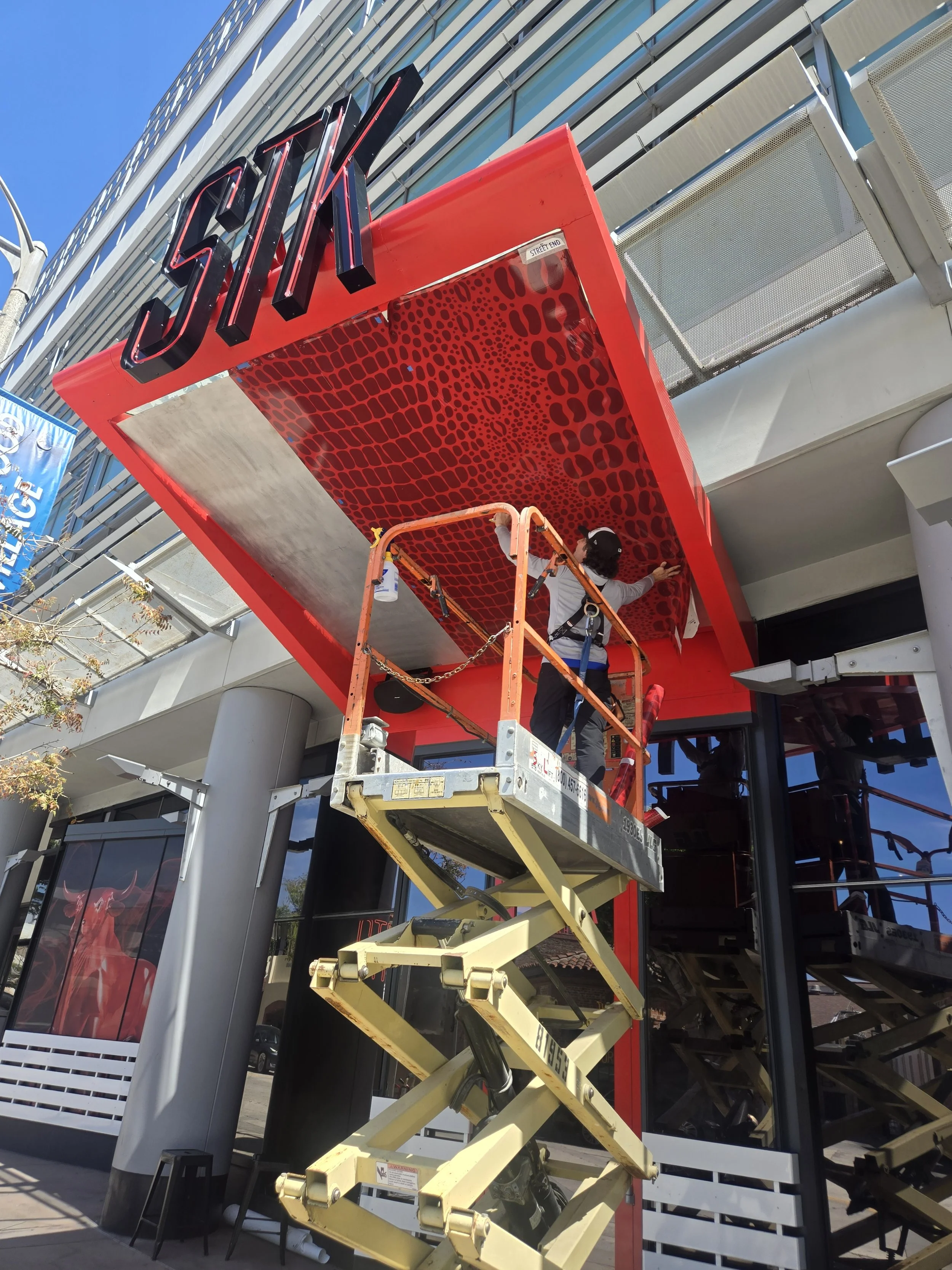Custom Printed Large Format Vinyl Graphics Los Angeles installed tounderside of canop of high end restaurant
