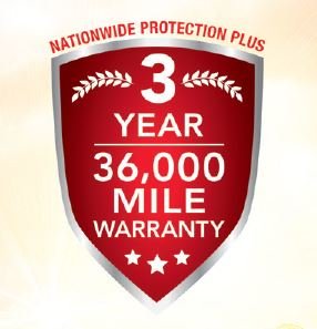 Red and gray shield-shaped badge indicating a 3-year, 36,000-mile warranty with laurel branches and three stars at the bottom.