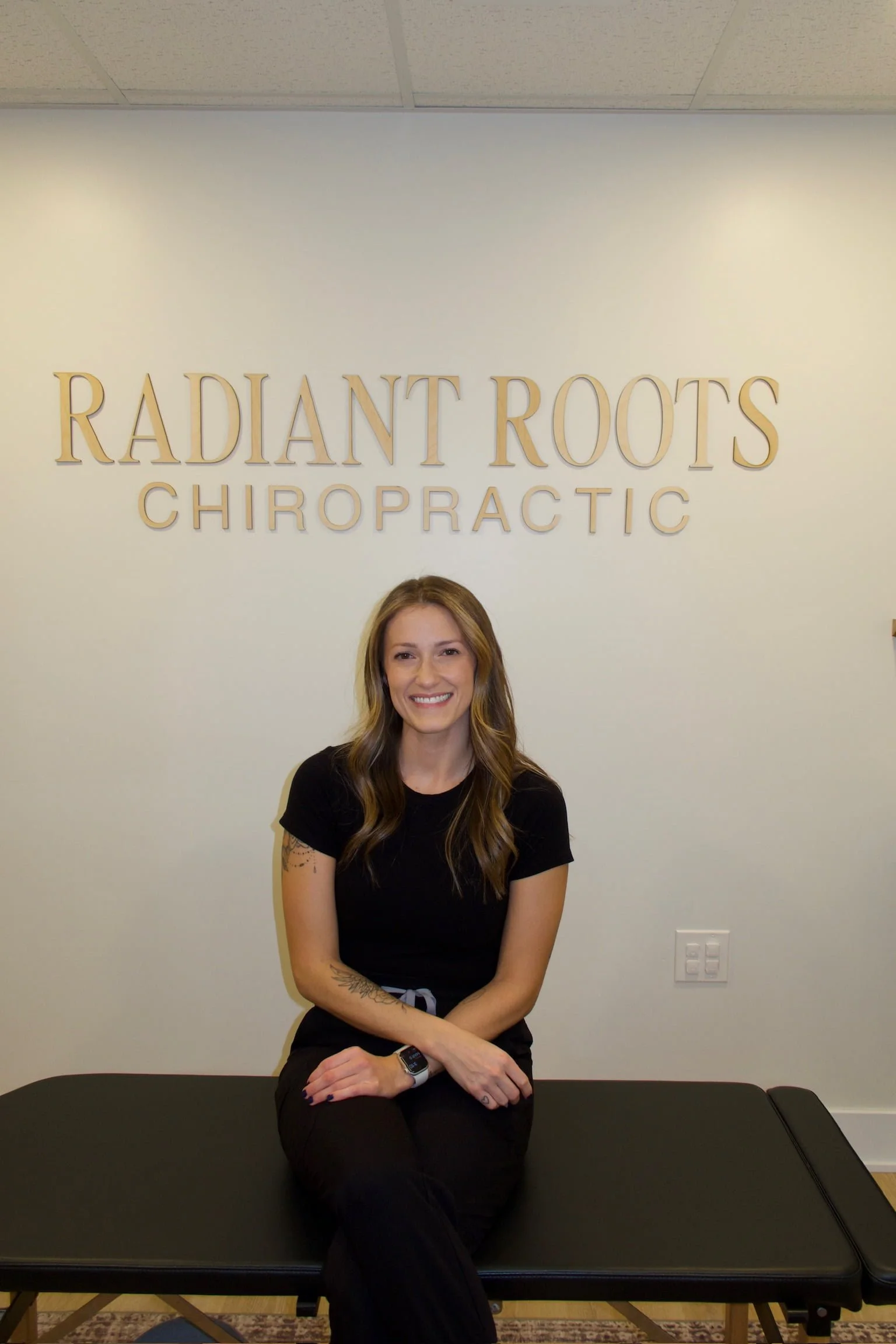 Dr. Rachel Marr. Female chiropractor who specializes in perinatal, pediatric, and family chiropractic care. Owner of Radiant Roots Chiropractic in Rochester Hills, MI.