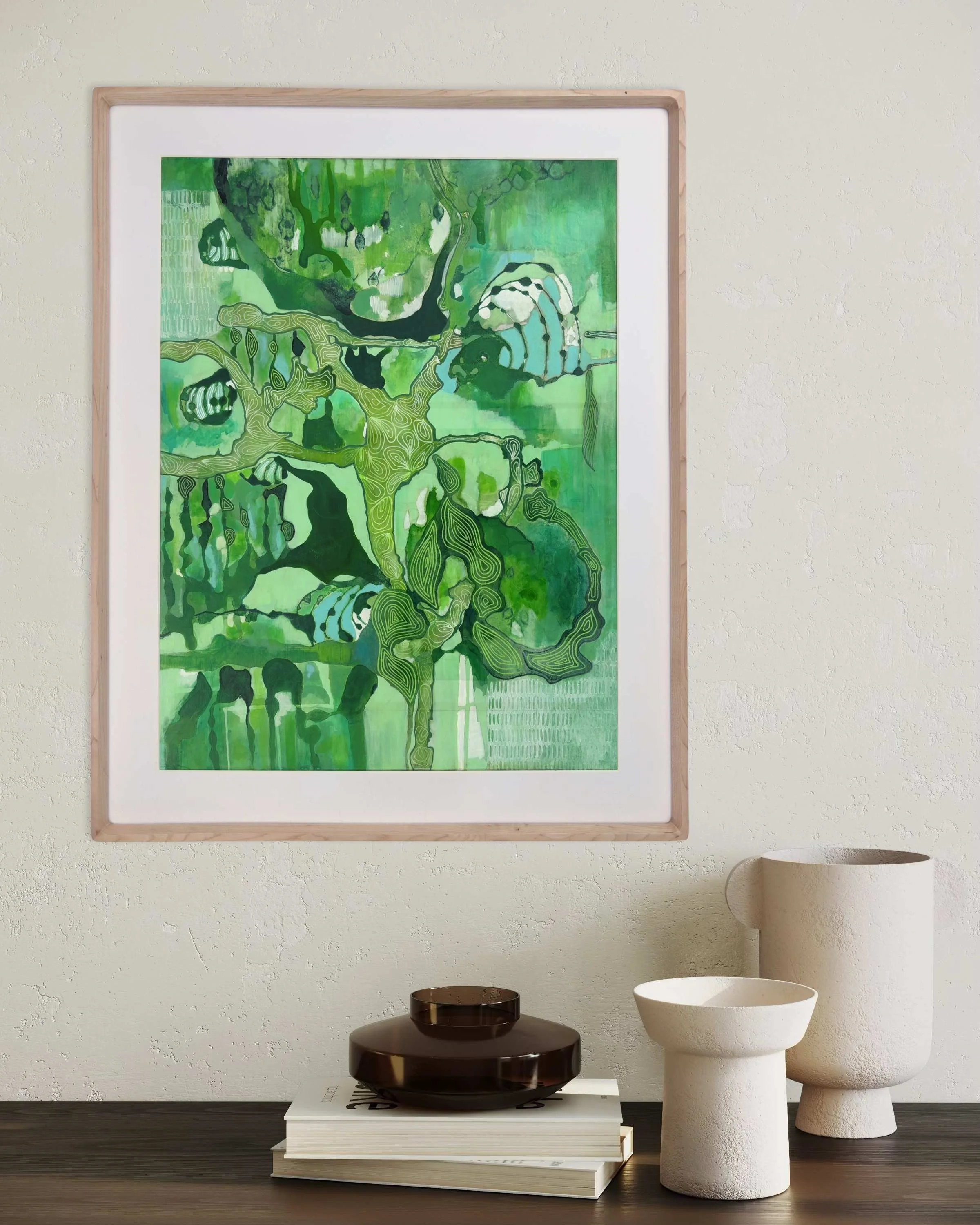 Abstract painting “Momentum” by Calie Durant displayed on a living room wall, showing scale and presence in a modern interior setting.