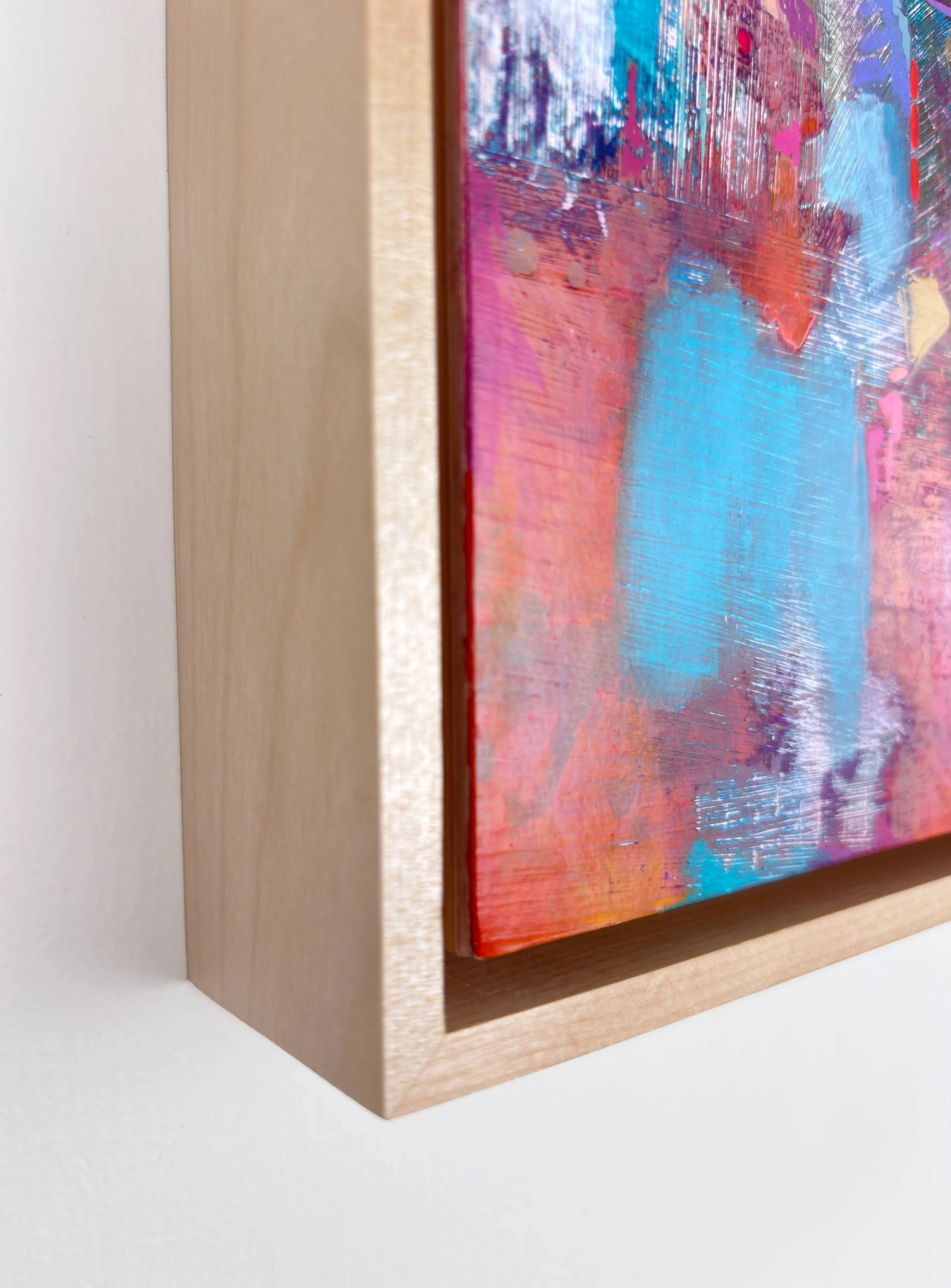 Corner detail of “Violet Current” by Calie Durant, framed in light maple wood, highlighting texture and craftsmanship.