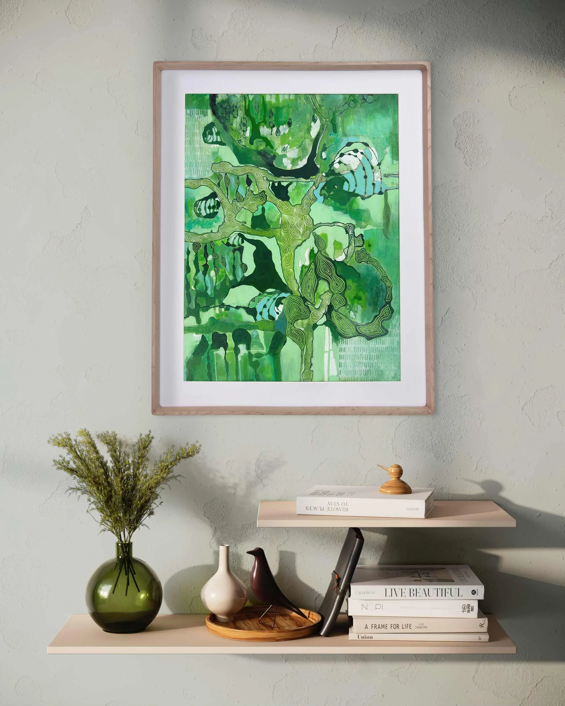 Abstract painting “Kaleidoscope” by Calie Durant displayed on a living room wall, showing scale and presence in a modern interior setting.