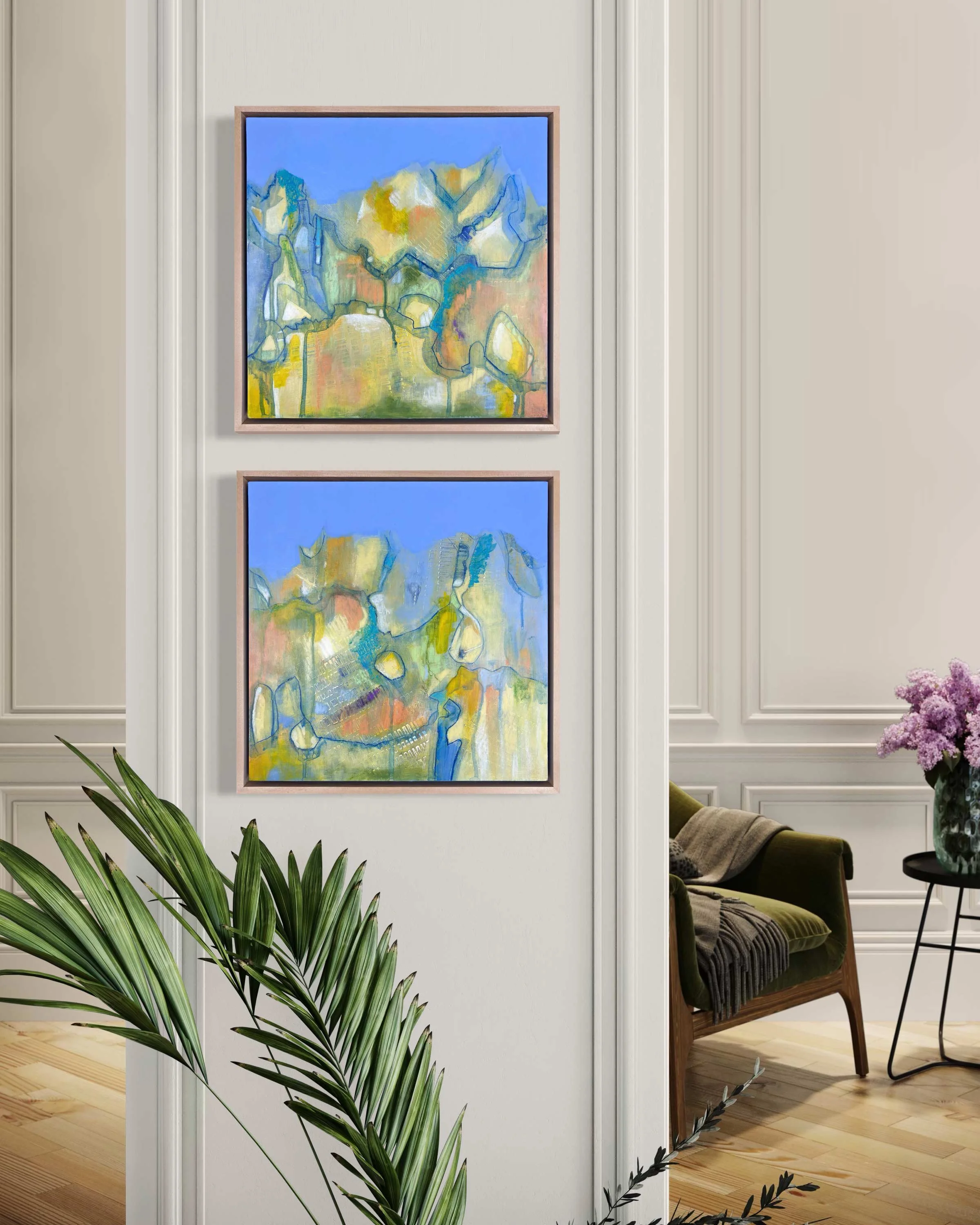 Pair of vertically stacked abstract paintings by Calie Durant displayed in a living room interior, featuring layered blues, greens, and warm tones, showing scale and wall placement.