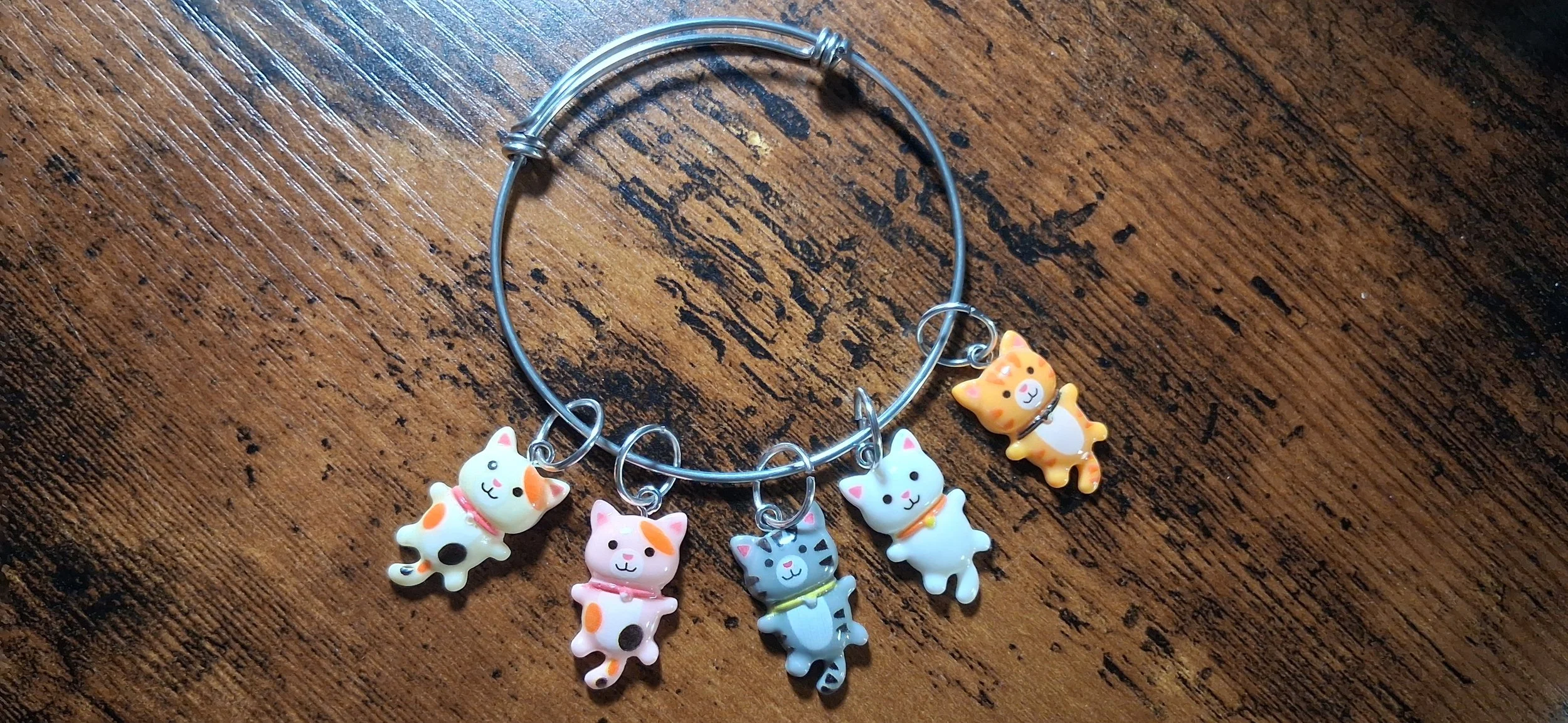 Kitty Charms all on a bracelet.jpg (Copy) (Copy) (Copy) (Copy)