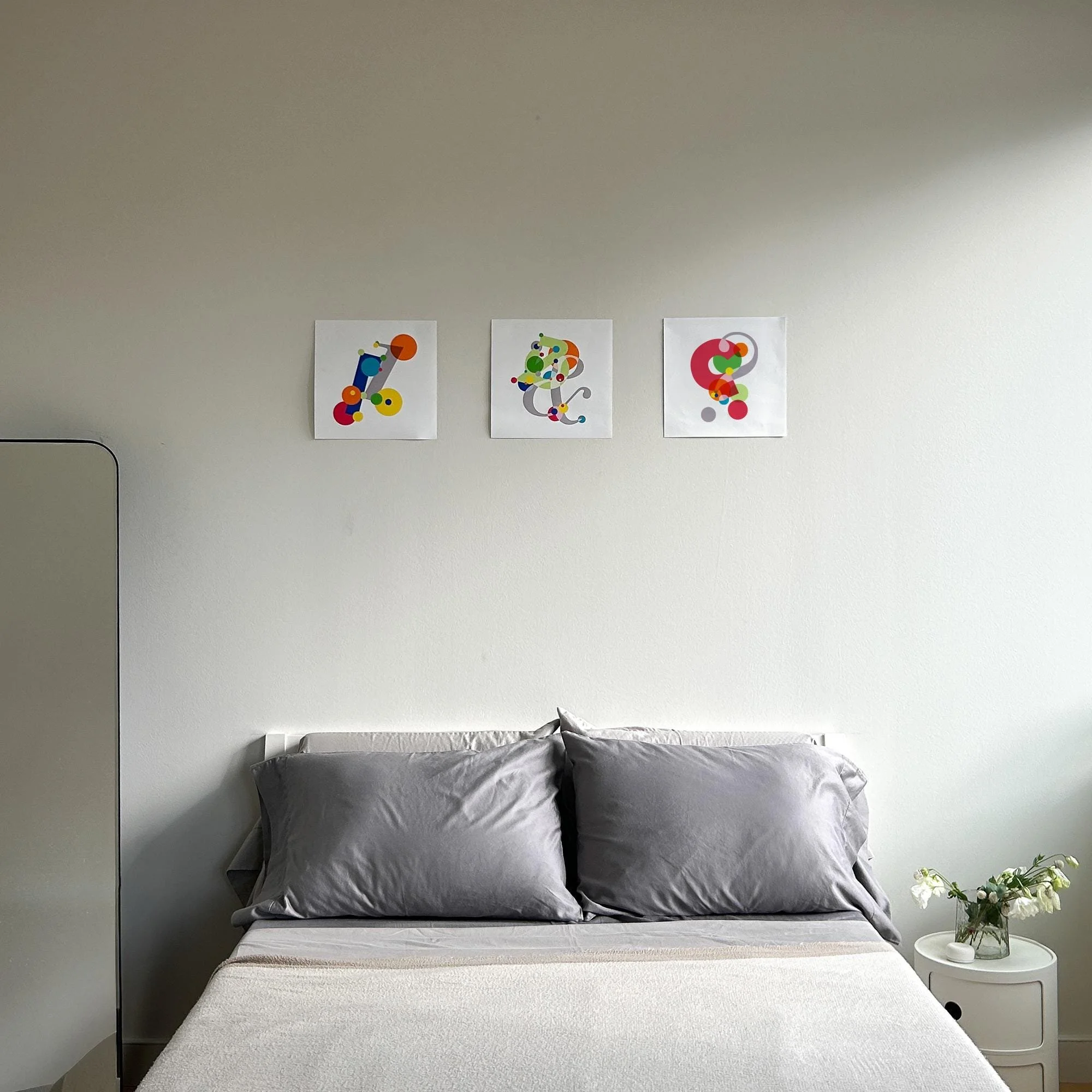 Bedroom statement pieces, hung above the bed: One : 1, Ampersand : &, Question Mark : ? . From the Peculiar Form collection.