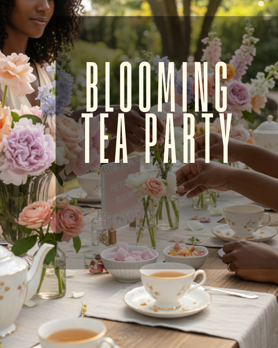 People having a tea party outdoors with pink and peach flowers, teacups, and desserts.