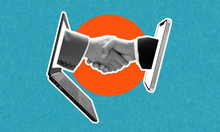 Digital illustration of a handshake between two businessmen, with each hand emerging from a laptop screen, against an orange circle background.