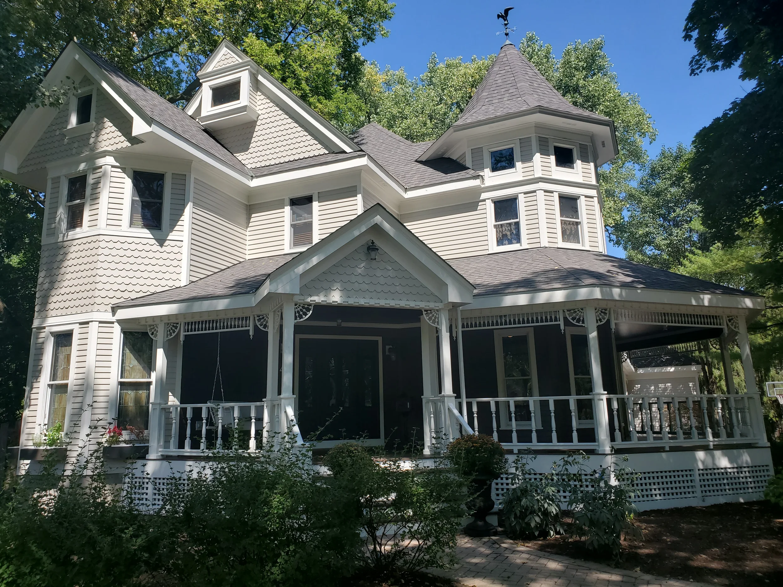 "Historic Victorian home exterior restoration and professional painting by Kora Pro Painting in Hinsdale, IL, utilizing meticulous preparation and premium Sherwin-Williams Emerald coatings."